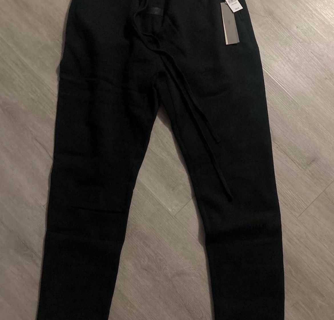 black essential fear of god joggers