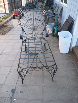Vintage wrote iron peacock chair