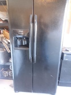 Black side by side refrigerator with 30-day warranty and delivery included!!!