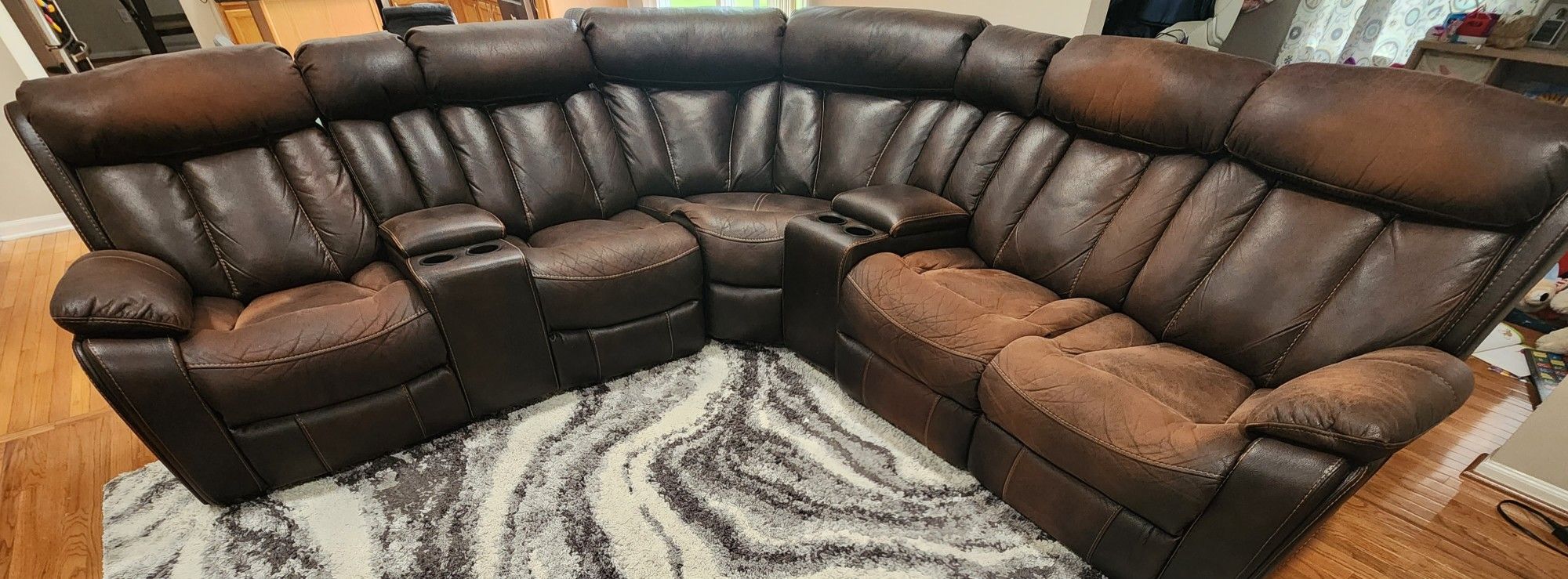 7 Piece Power recliner leather sectional. 3 power recliners with 4 cup holders and 4 usb charging