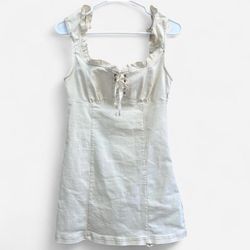 Urban Outfitters off-white denim mini dress with lace-up front and ruffled trim size S - NWT 