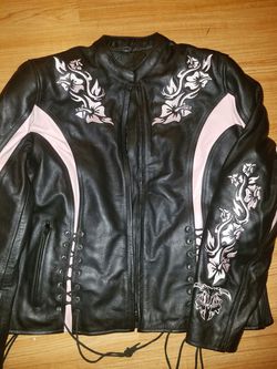 Motorcycle jacket $150.00 leather & padded. pink and black. Large .