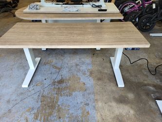 1- used Sitstand Electric Desk ..75.00 Each