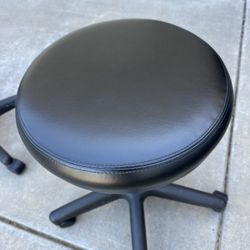 2 black Leather Stools