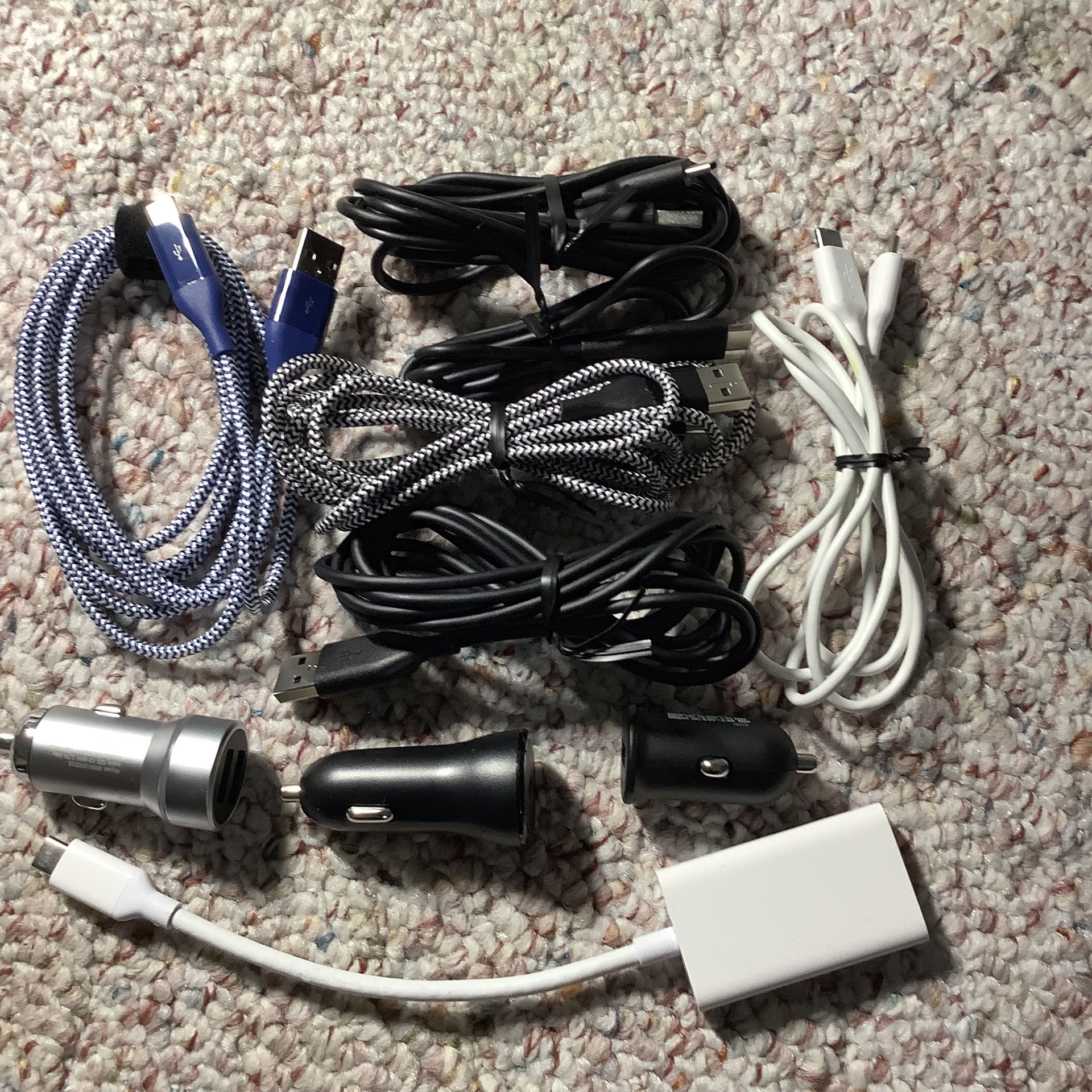 Bundle. Assortment of 5 USB TO USB-C , 1 USB -C TO USB-C CABLE, 3 CAR CHARGING ADAPTERS, AND ONE USB-C TO HDMI ADAPTER.