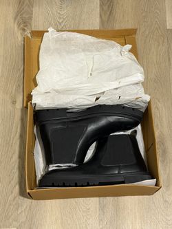Black leather Chelsea boots with chunky sole