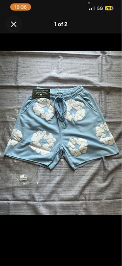 Light blue denim tear shorts