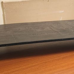 Sturdy Wooden TV Stand Shelf Hand Made and Painted in all Black with felt cushioning on all four corners. 
Measures 31" Long x 15" Deep x 3.5" Tall.