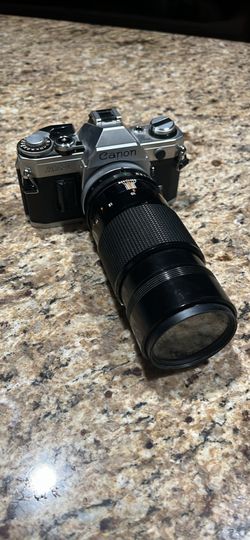 Canon AE-1 with 200 mm lens