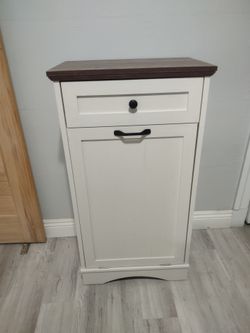 Brand new Ashley wood tilt trash can cabinet
