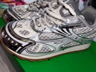 Sure. Use this full title: Bottega Veneta Orbit sneakers, white silver green, EU 38, worn twice, box and dust bag included. That should meet their len