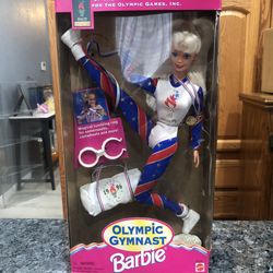 Barbie doll Vintage 1996 Atlanta Olympic Gymnast figure rare MATTEL.  Brand new factory sealed.  The plastic is bent some on the right side.  See pict