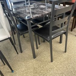 Table and 4 chairs 🪑 brand new in box for easy pick up or same day delivery 🚚   Mattress +   601 w lake st Addison il 60101                  Busines