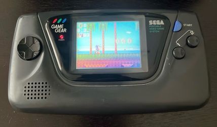 Sega game gear with case brand new clear housing 2 games