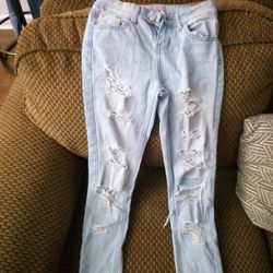 Girls distressed blue jeans