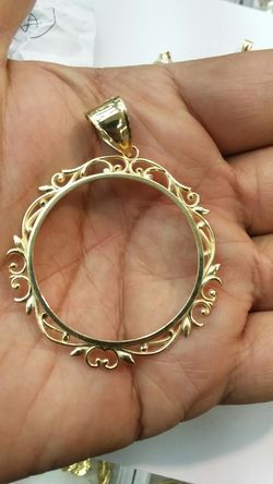 14k Gold centenario bezel 8.6 grams