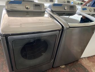 New with a few scratches or dents Samsung top load washer & electric dryer set with 6 months warranty