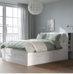 White queen bed frame and dresser