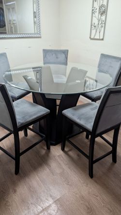 Dining table with five chairs