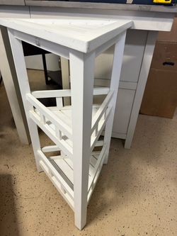 White triangle shelf unit
