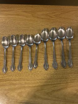 9 COLUMBIA STAINLESS STEEL SPOONS 