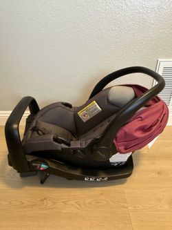 Evenflo baby car seat and car attachment