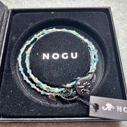 Brand New NOGU Turquoise, White, and Gold Stretch Necklace/Bracelet with Tags and Box