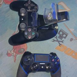 2 Ps4  Controllers, 2 Ps2 Controllers, 5 Ps2 Games And A Sylvania DVD Player