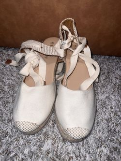 Cream-colored espadrille wedge sandals with ankle ties, size 9