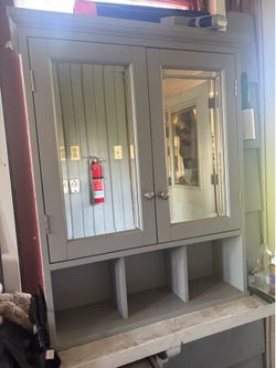 Mirrored medicine cabinet