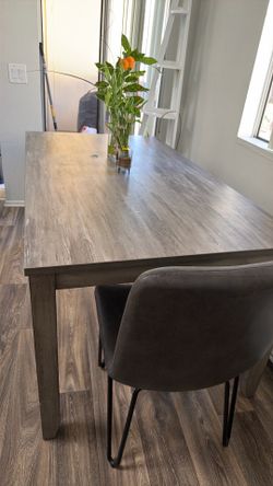 Dinning table and two chairs  must go