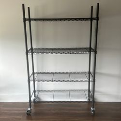 Black Metal Shelving Unit on Wheels