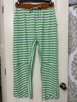 Bucketlist Striped Parachute Pants in green and white.