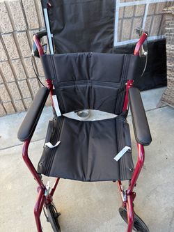 Medline Lightweight Foldable Transport Wheelchair with Handbrakes and 12-Inch Wheels