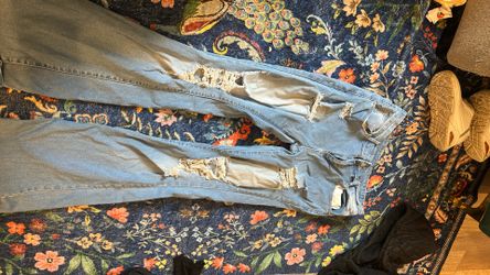 #9: Flared Stretchy Denim Ripped High Waisted