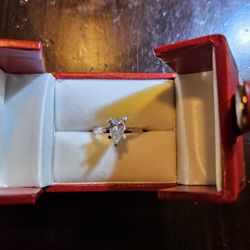 Unique CZ STONE, Set In Sterling Silver Size 7 