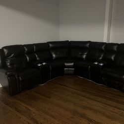 BLACK LEATHER RECLINING SECTIONAL 