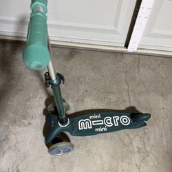Green Mini micro scooter 
