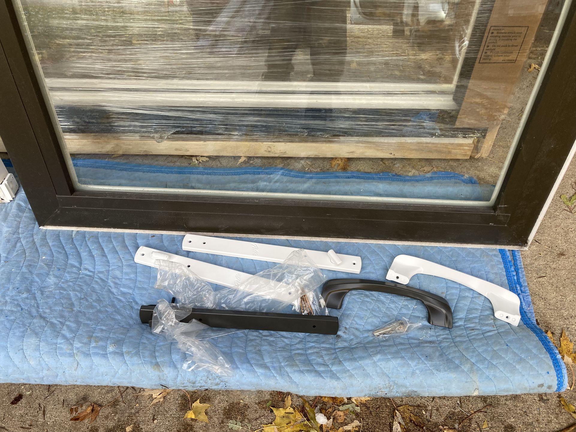 New Patio doors , brown exterior , vinyl , XO operation , 72 by 80 ,