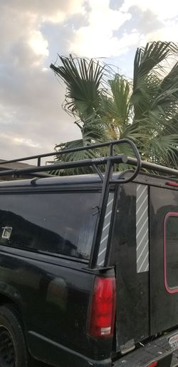 Camper shell and rack ladders