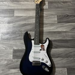 Blue 6 String Guitar