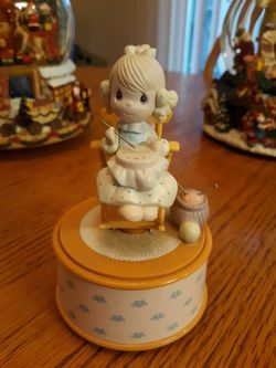 Precious Moments music box figurine