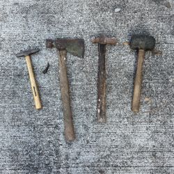 4-tool claw hammer, axe, rubber mallet combo
