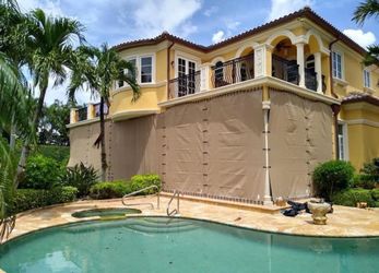Hurricane shutters
