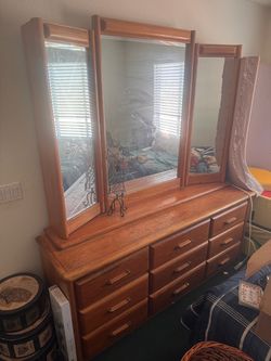 9-Drawer Honey-Finish Dresser with Tri-Fold Mirror & Hidden Storage