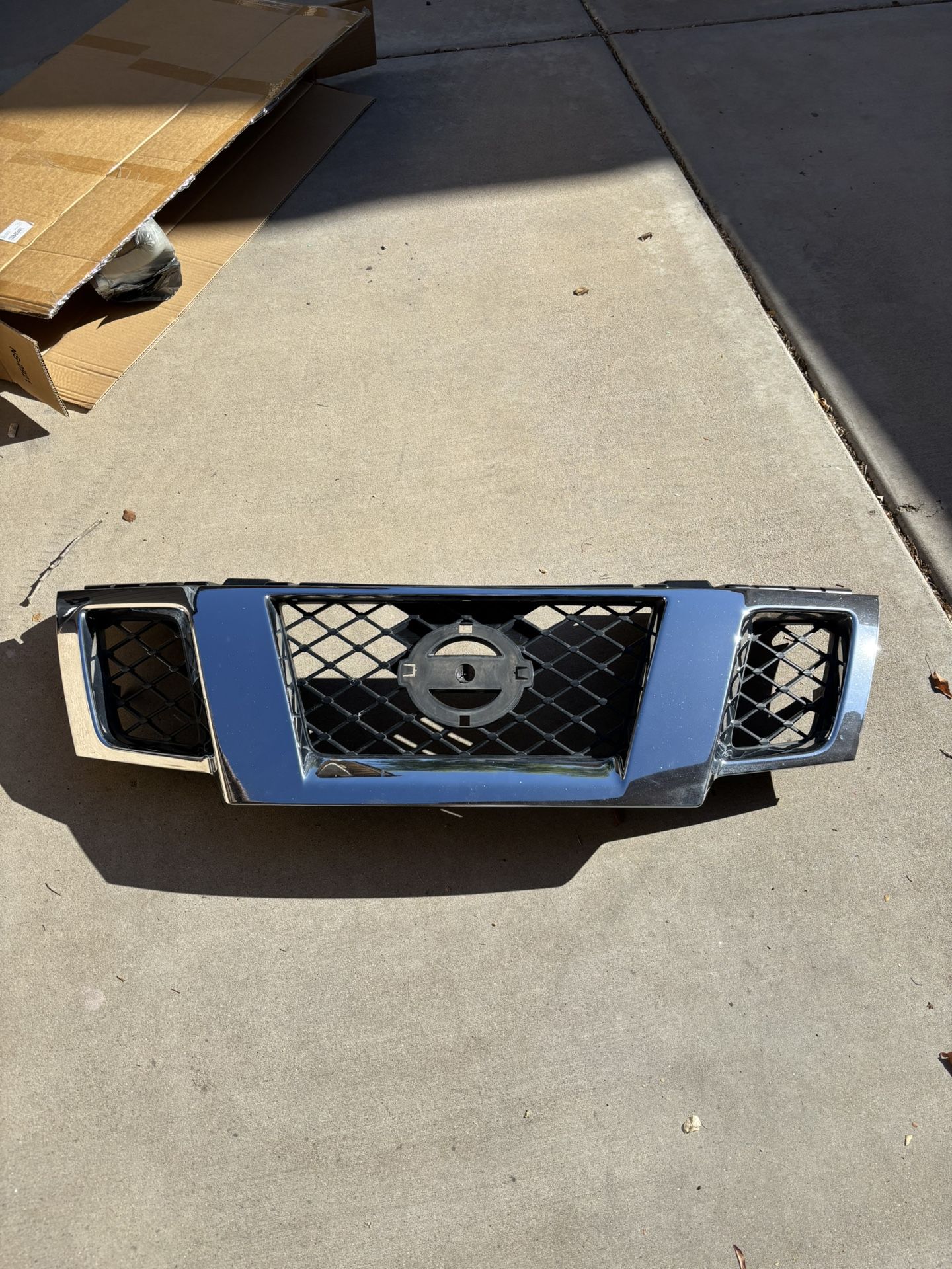 Nissan Frontier Chrome Grille. 