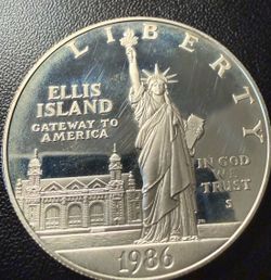 1986 one ounce silver “Ellis Island” Statue of Liberty Coin