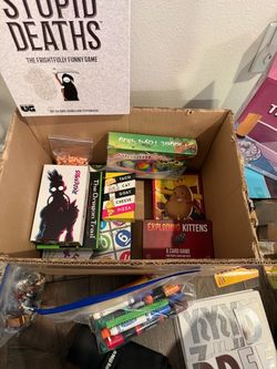 Box of games and craft supplies