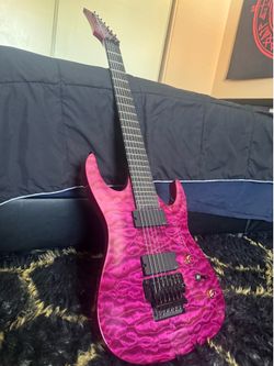 Agile Interceptor Pro 7 string guitar (purple tribal)