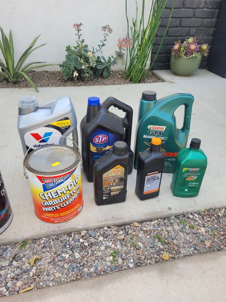 Lot of Motor Oil, Transmission Fluid, Brakes Fluid and More